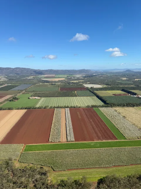 Aerial view of patchwork farmland fields across the Tablelands.