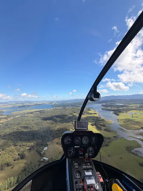Cockpit view over Lake Tinaroo's winding waterways and farmland.